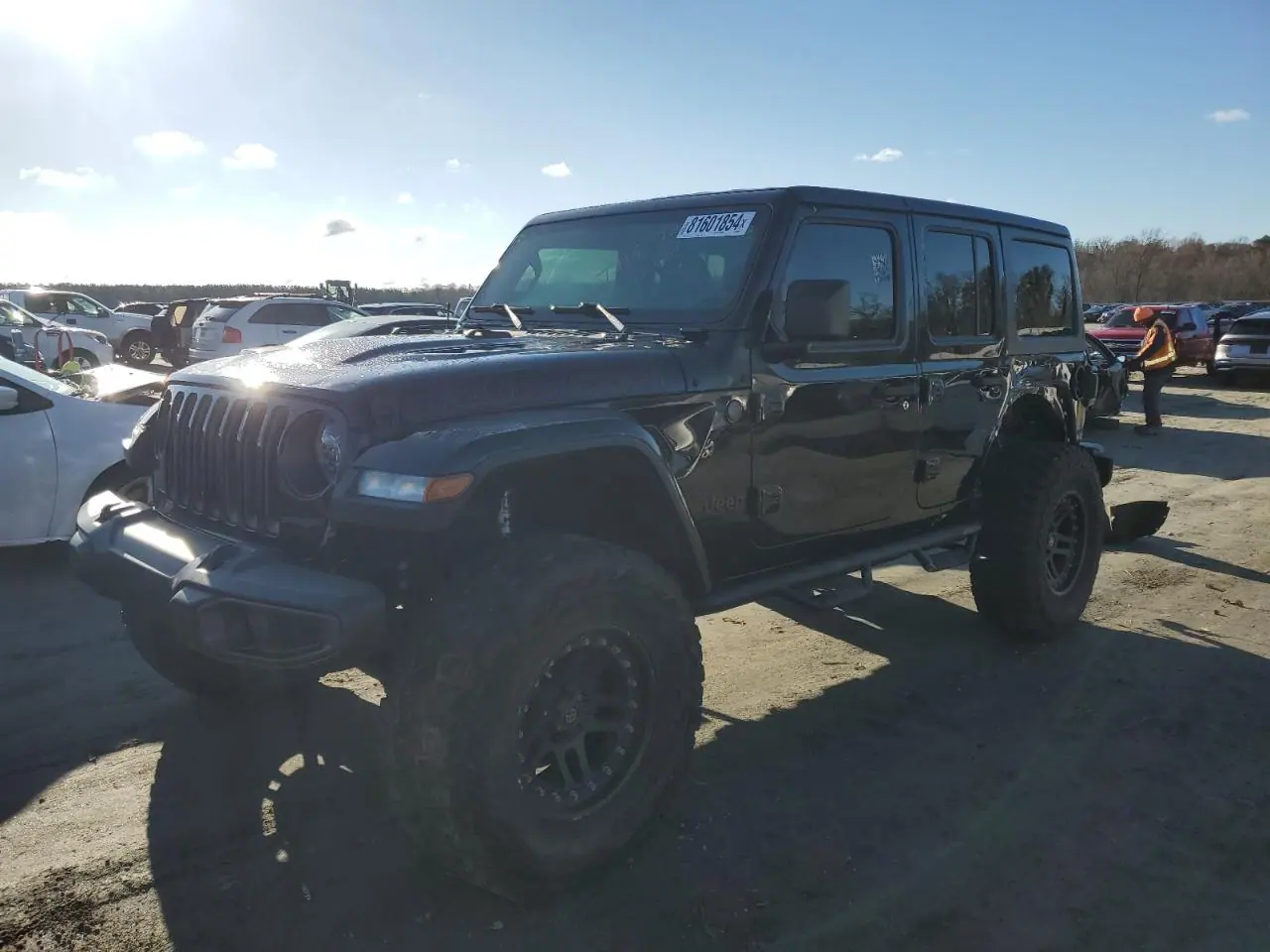 2020 Jeep Wrangler VIN 1C4HJXFN1LW326922 - photo 1 of 14