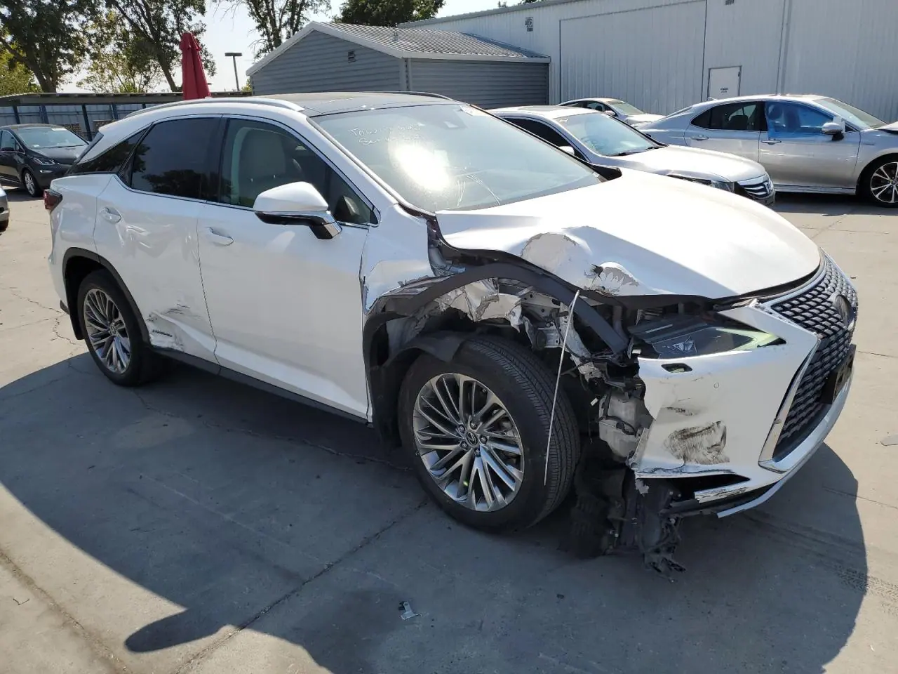 2020 Lexus RX VIN 2T2JGMDA7LC055254 - photo 1 of 13