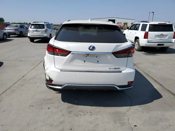 2020 Lexus RX VIN 2T2JGMDA7LC055254 - photo 4 of 13